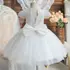 Kép 2/5 - Fehér flitteres hímzett masnis kislány alkalmi ruha koszorúslány ruha keresztelőre is